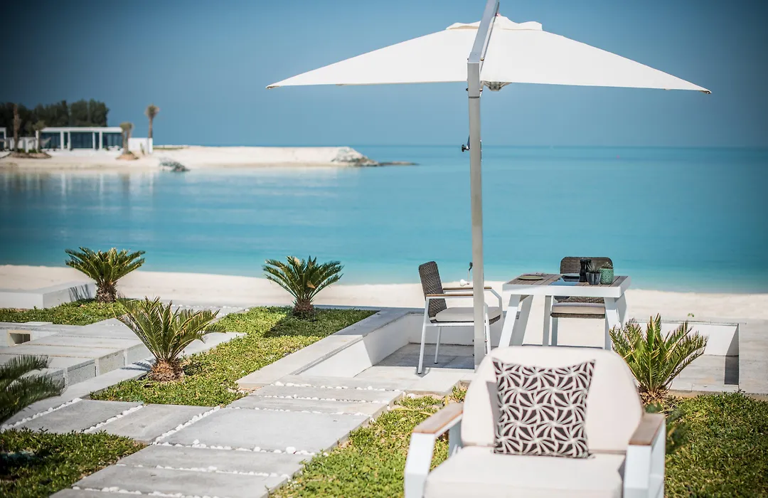 Zaya Nurai Island private island resort Abu Dhabi luxury beachfront villa infinity pool
